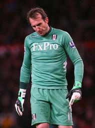 MANCHESTER, ENGLAND - JANUARY 26: Mark Schwarzer of Fulham looks dejected during the FA Cup with Budweiser Fourth Round match between Manchester United and Fulham at Old Trafford